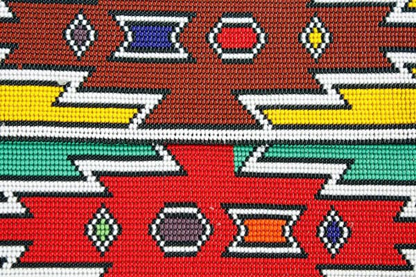 cape-town-markets-2024 A vibrant close-up of an intricate African pattern showcasing a variety of colors and designs.